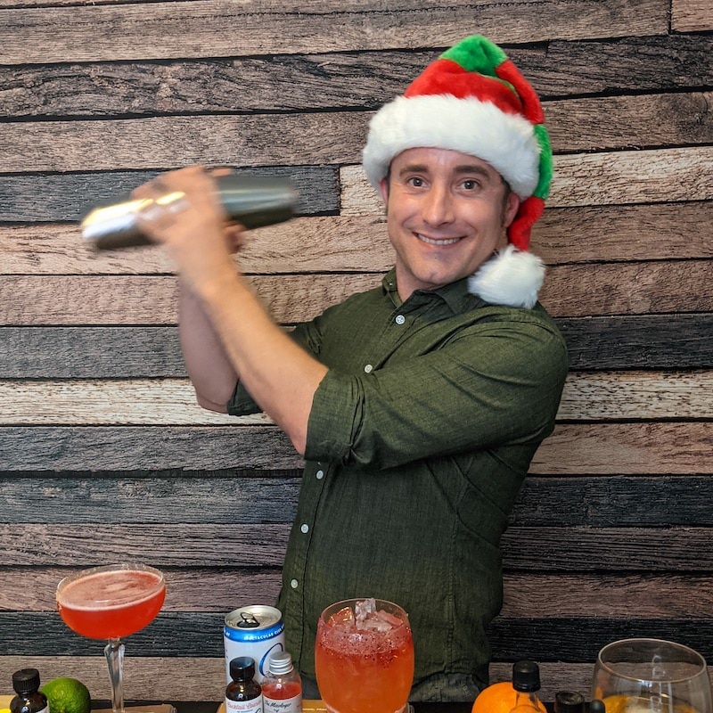 The best gifts for mixologists, like Evan shown here shaking up cocktails