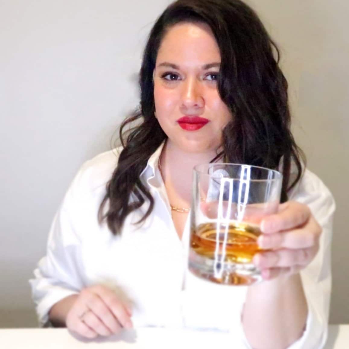 headshot-jen-d@2x Heather holding a beer stein