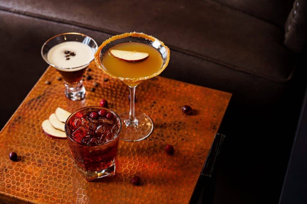 three cocktails being used for client appreciation event