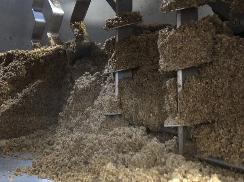 spent grain being dumped spent grain