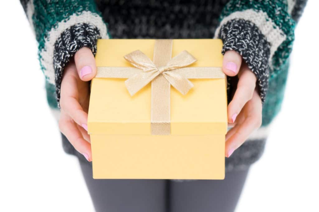 Christmas woman with gift on white background isolated for happy new year 2018 concept