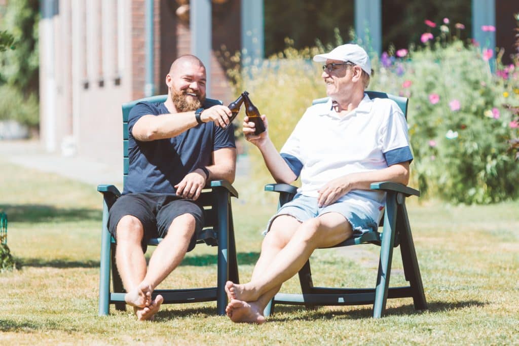 Dad and son toasting, Father's Day cheers