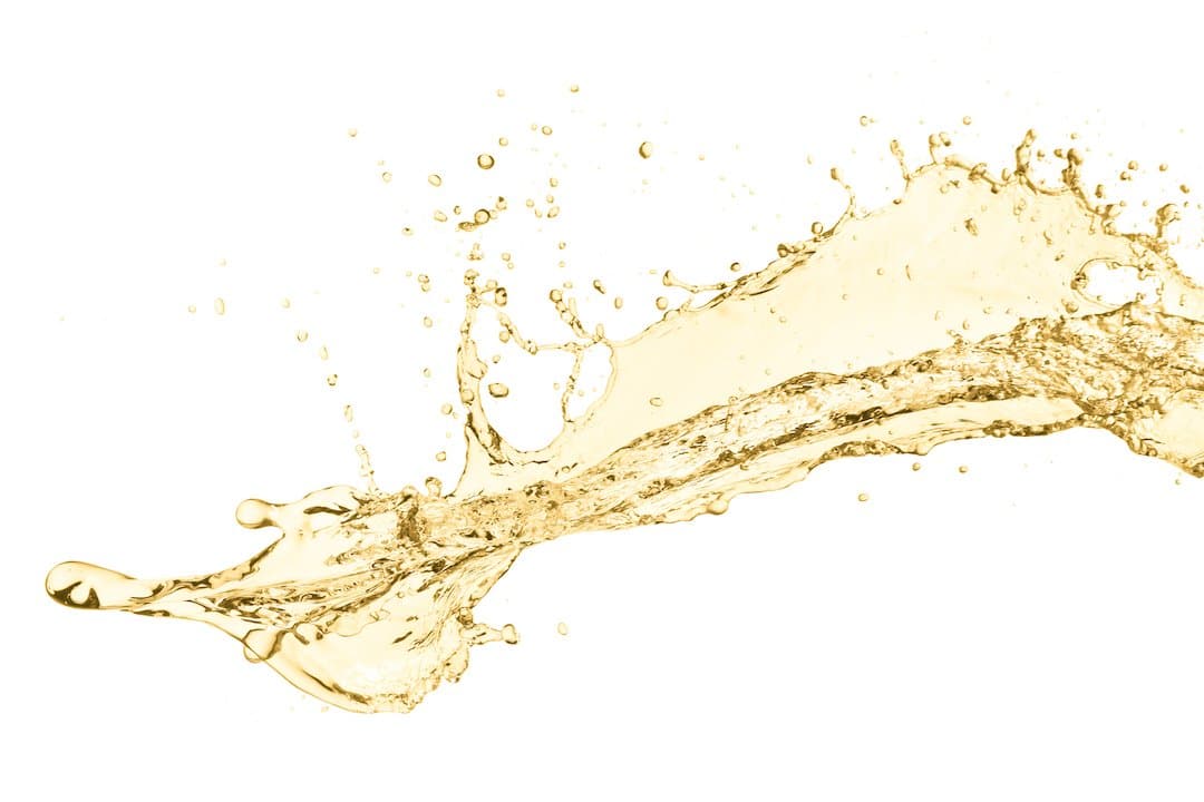 splash of white wine splash of white wine, isolated on white background